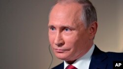 Владимир Путин во время интервью агентству Bloomberg