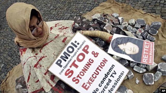 A women poses during a demonstration of the National Council of Resistance of Iran against stoning and death penalty in Berlin, Germany (File)