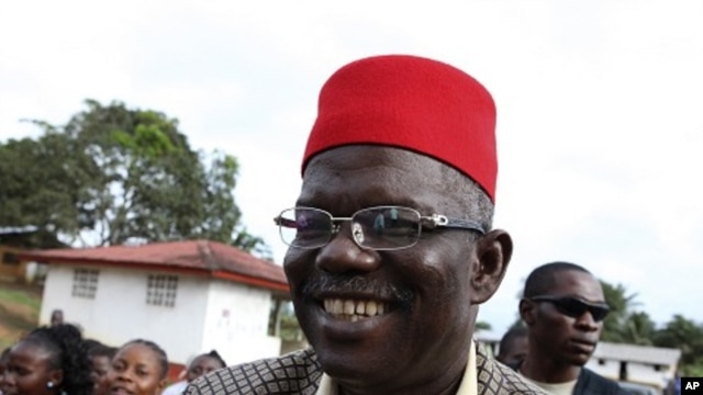 Liberian warlord-turned-presidential candidate Prince Johnson campaigns in the village of Demeh in Bomi County, in the West African country September 14, 2011.