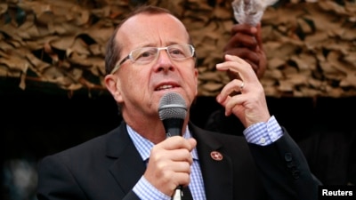 FILE - U.N. special envoy to Congo, Martin Kobler, addresses troops outside Goma in the eastern Democratic Republic of Congo, Aug. 31, 2013. 