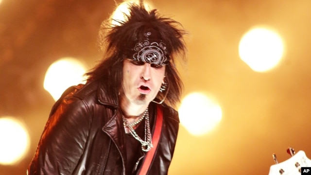 FILE - In this April 28, 2015 file photo, Nikki Sixx of Motley Crue performs in concert with the band Sixx:A.M. at The Electric Factory in Philadelphia.