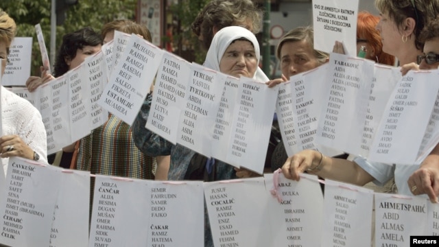 Bosnian Muslim women from Visegrad hold a peaceful protest of the U.N. war crimes tribunal's failure to include counts of rape in indictments against Bosnian Serb cousins Milan and Sredoje Lukic, Sarajevo, July 18, 2008.