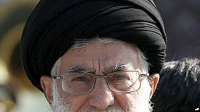 Iran's Supreme Leader Ayatollah Ali Khamenei looks on as he attends the Iranian army land force academy graduating ceremony in Tehran, November 10, 2011.