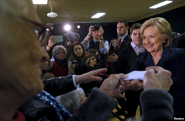 Democratic presidential candidate Hillary Clinton greets attendees at a campaign event in Vinton, Iowa, Jan. 21, 2016.