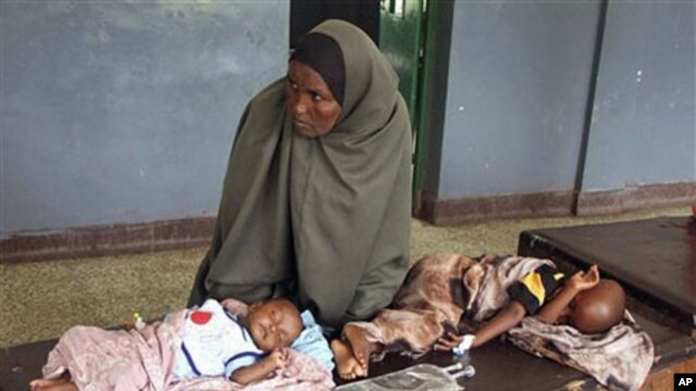 Malnourished children from southern Somalia on a bed at Bandar hospital in Mogadishu, Somalia, August 1, 2011