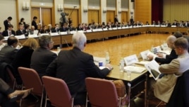 Delegates of more than 60 countries and organizations attend the international meeting to coordinate sanctions on the government of Syrian President Bashar Assad in Tokyo, Japan, November 30, 2012.