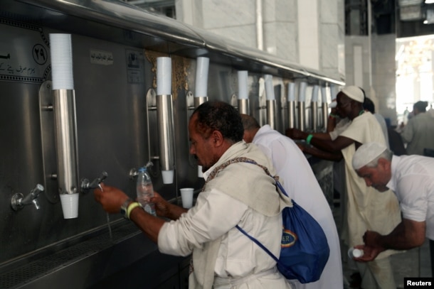 Muslim pilgrims drink Zamzam water at the Grand Mosque in Mecca, Saudi Arabia September 8, 2016.