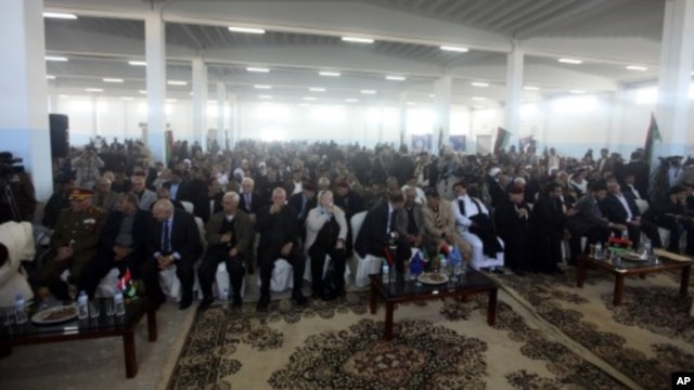 People attend a founding conference of the council of the Cyrenaica province in Benghazi, March 6, 2012.  