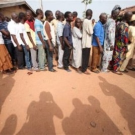 People wait to be registered at a polling station at Oyeleye in Ibadan, Nigeria.