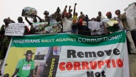 People protest following the removal of  fuel subsidy by the Government in Lagos ,Nigeria, Jan. 9, 2012. Labor unions began a paralyzing national strike in oil-rich Nigeria, angered by soaring fuel prices and decades of engrained government corruption in 