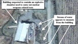 April 9, 2012 photo provided by the Institute for Science and International Security, shows suspected cleanup activities at a building alleged to contain a high explosive chamber used for nuclear weapon related tests in the Parchin military complex in Ira