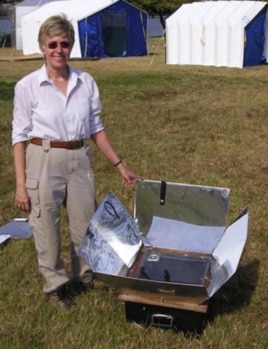 Patricia McArdle with a solar cooker, similar to the one she introduced to Afghan villagers.
