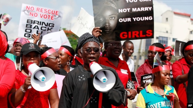 Rights activist Femi Falana, center, leads a mass-demonstration calling for increased efforts to rescue the hundreds of missing kidnapped school girls in Lagos, Nigeria, on May 5, 2014.  