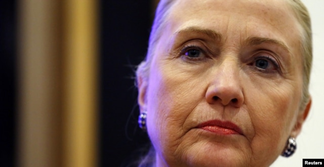 Secretary of State Hillary Clinton listens to a question during a news conference in Dublin, Ireland, December 6, 2012.