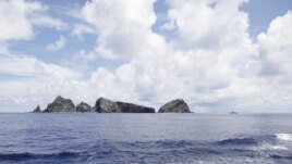 A group of disputed islands known as Senkaku in Japan and Diaoyu in China is seen from the city government of Tokyo's survey vessel in the East China Sea, September 2, 2012.