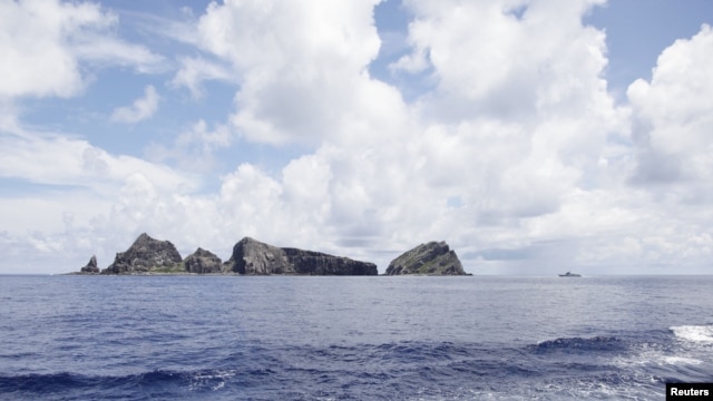 A group of disputed islands known as Senkaku in Japan and Diaoyu in China is seen from the city government of Tokyo's survey vessel in the East China Sea, September 2, 2012.