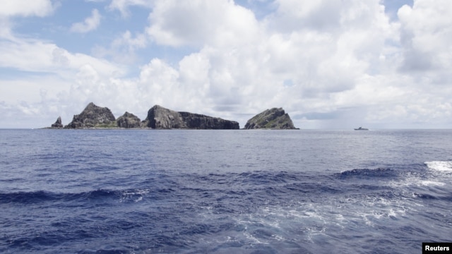 A group of disputed islands known as Senkaku in Japan and Diaoyu in China is seen from the city government of Tokyo's survey vessel in the East China Sea, September 2, 2012.