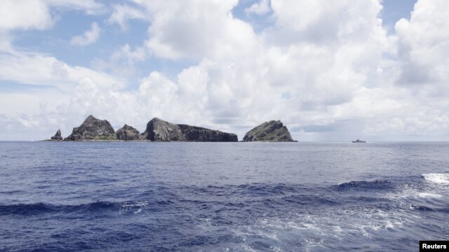 A group of disputed islands known as Senkaku in Japan and Diaoyu in China is seen from the city government of Tokyo's survey vessel in the East China Sea, September 2, 2012.
