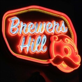 Mr. Boh looks out over Baltimore from Brewers Hill