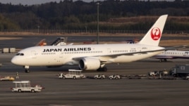 A Japan Airlines' (JAL) Boeing Co's 787 plane is seen at New Tokyo international airport in Narita, Jan. 9, 2013.