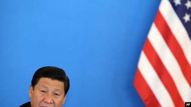 Chinese Vice President Xi Jinping speaks with U.S. Vice President Joe Biden (not pictured) at a China-U.S. Business Dialogue in Beijing, China, August 19, 2011.