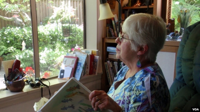 Joan Davies Rapp of Tacoma, Washington, counts and records bird sightings outside her living room window as part of Project FeederWatch.