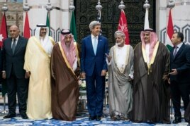 (L to R) Egypt's Foreign Minister is joined by counterparts from Kuwait, Saudi Arabia, the U.S., Oman, Bahrain, and Lebanon at King Abdulaziz International Airport’s Royal Terminal in Jeddah, Sept. 11, 2014.