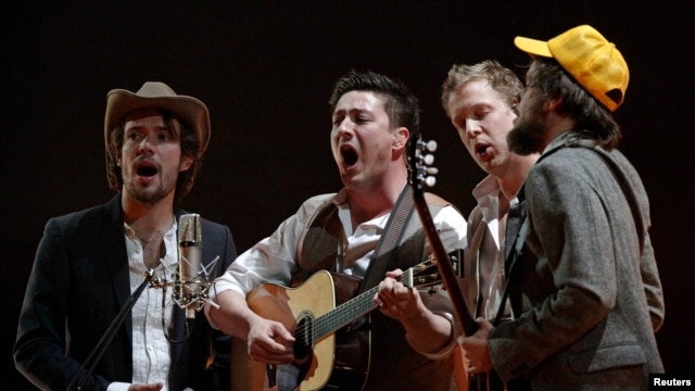 Mumford & Sons perform on stage during the BRIT music awards at the O2 Arena in London February 15, 2011.