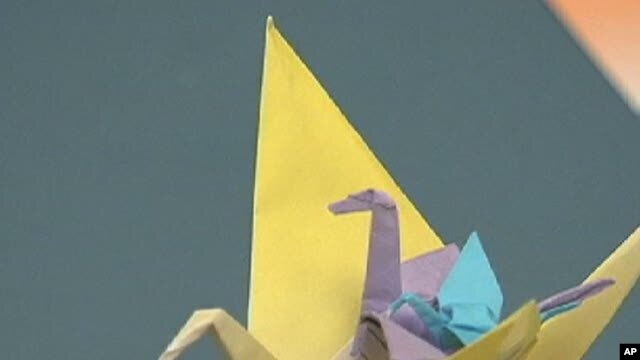 At Somerville Elementary School in Ridgewood, New Jersey, students honor victims of the disasters that hit Japan with a veritable flock of paper origami cranes