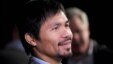 FILE - Manny Pacquiao at a press conference in New York City.  Pacquiao has lost a lucrative contract with U.S. sportswear maker Nike, after describing gays and lesbians as "worse than animals."