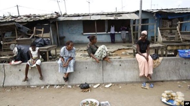 Market vendors display their meager stock of available goods at a street market in the Youpougon neighborhood of Abidjan, April 9, 2011
