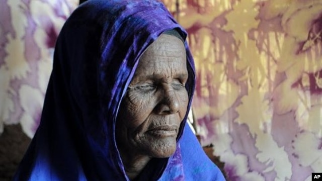 Ibado Mahmud, 50, at the Dagahaley camp in Dadaab, Kenya. Mahmud had her eyes removed by Ethiopian troops before travelling to the camps. Doctors believe she is suffering from post-traumatic stress disorder.