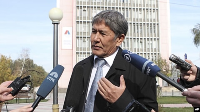 Prime Minister and presidential candidate Almazbek Atambayev talks to journalists in the capital Bishkek, October 31, 2011.