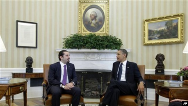 President Barack Obama meets with Lebanese Prime Minister Saad Hariri in the Oval Office of the White House in Washington, 12 Jan 2011