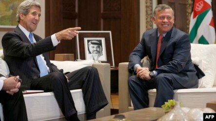 U.S. Secretary of State John Kerry (L) meets with Jordan's King Abdullah in Amman, on May 22, 2013.