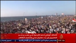 A screenshot of Aljazeera channel showing anti-government protests in the Egyptian port city of Alexandria on Aug. 30, 2013