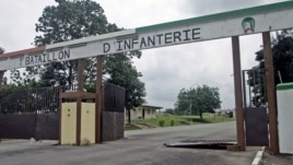 The entrance to an army base camp that was the scene of recent fighting in Abidjan, Ivory Coast, August 6, 2012. 