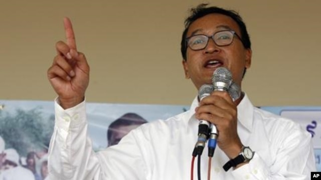 Sam Rainsy, leader of Cambodia's opposition Sam Rainsy Party, speaks during a campaign rally in Kandal province in 2008.