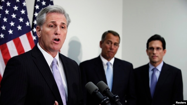 FILE - House Majority Whip Kevin McCarthy speaks next to House Speaker John Boehner (C) and current Majority Leader Eric Cantor during a news conference on Capitol Hill in Washington.