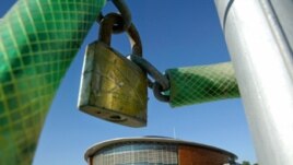 A padlock hangs outside the Tae Kwon Do and Handball stadium at the Faliro Coastal Zone, near Athens, August 8, 2005.