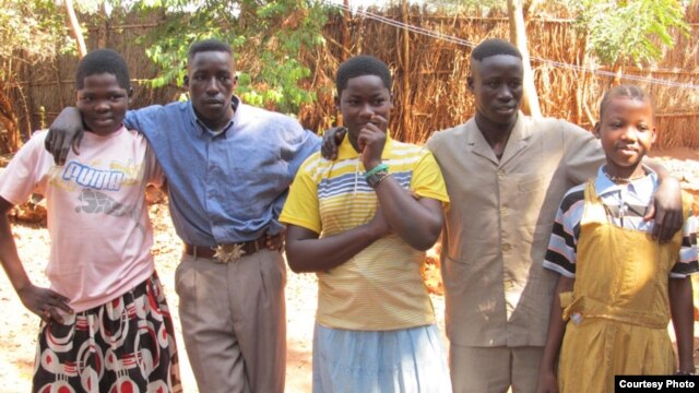 Photo of five people who escaped the LRA and went to a Safe Reporting Site in the Central African Republic in November 2012. 