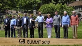 World leaders attend the family photo session during the G8 Summit at Camp David, Maryland, May 19, 2012.