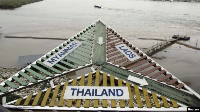 A sign at the Thai village of Sop Ruak on the Mekong river in the Golden Triangle,  the opium-growing region straddling Myanmar, Laos and Thailand. Picture taken on January 14, 2012. 