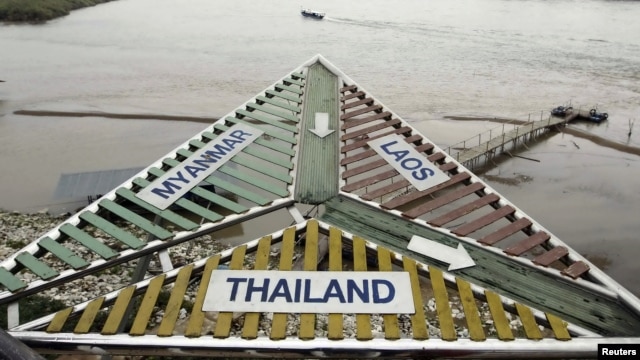 Border sign on Mekong River