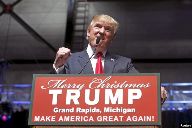 U.S. Republican presidential candidate Donald Trump addresses the crowd during a campaign rally in Grand Rapids, Michigan, Dec. 21, 2015.