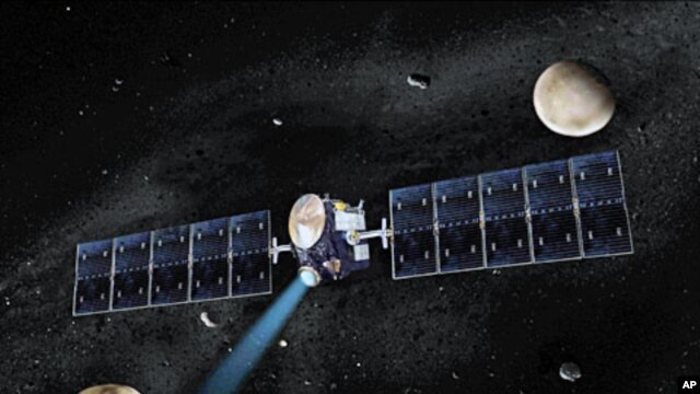 Artist's concept of NASA's Dawn spacecraft. The giant asteroid Vesta, Dawn's current destination, is on the lower left. Another larger asteroid and Dawn's second destination, Ceres, is on the upper right