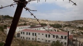 A view of the immigrant shelter in Lampedusa, the tiny Italian island close to North Africa, taken Monday, April 11, 2011.
