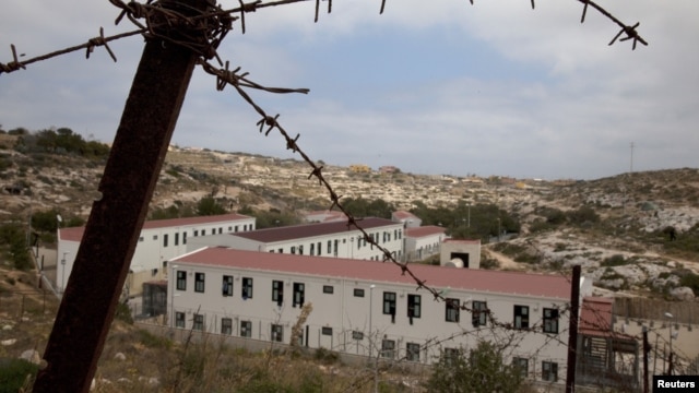 A view of the immigrant shelter in Lampedusa, the tiny Italian island close to North Africa, taken Monday, April 11, 2011.