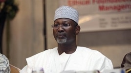 Nigeria's electoral chief and academic Attahiru Jega attends a meeting with staff from the Independent National Electoral Commission  in Abuja, March 17, 2011. (AP Image)