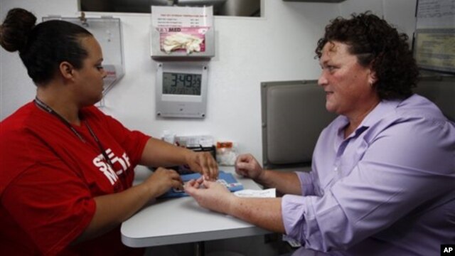 A woman in Los Angeles gets an HIV test.